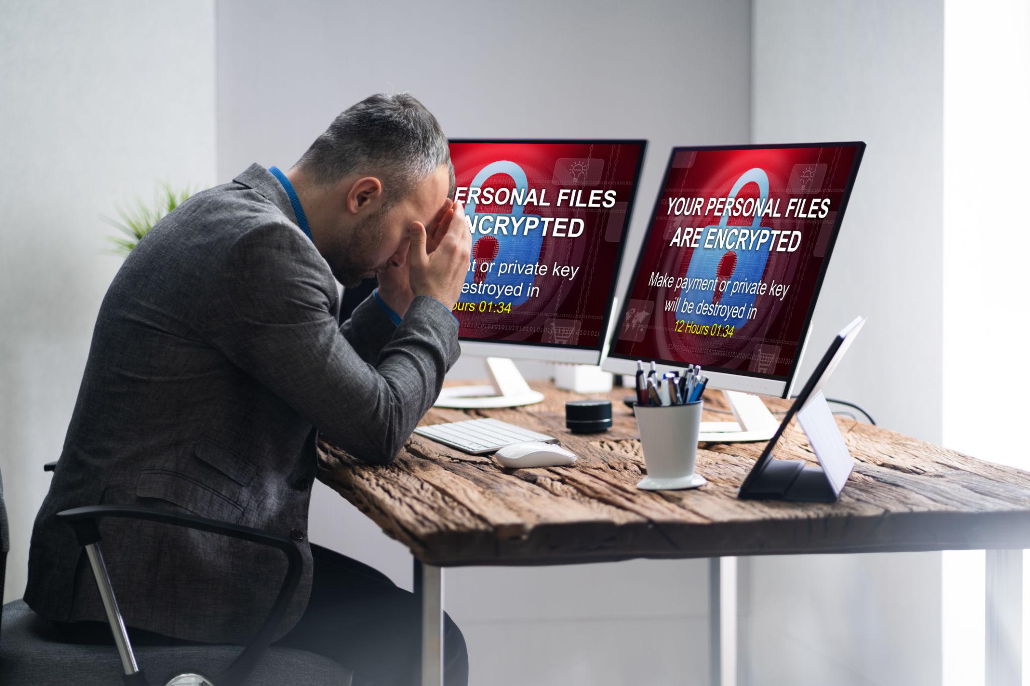 Business owner responding to a cyber attack